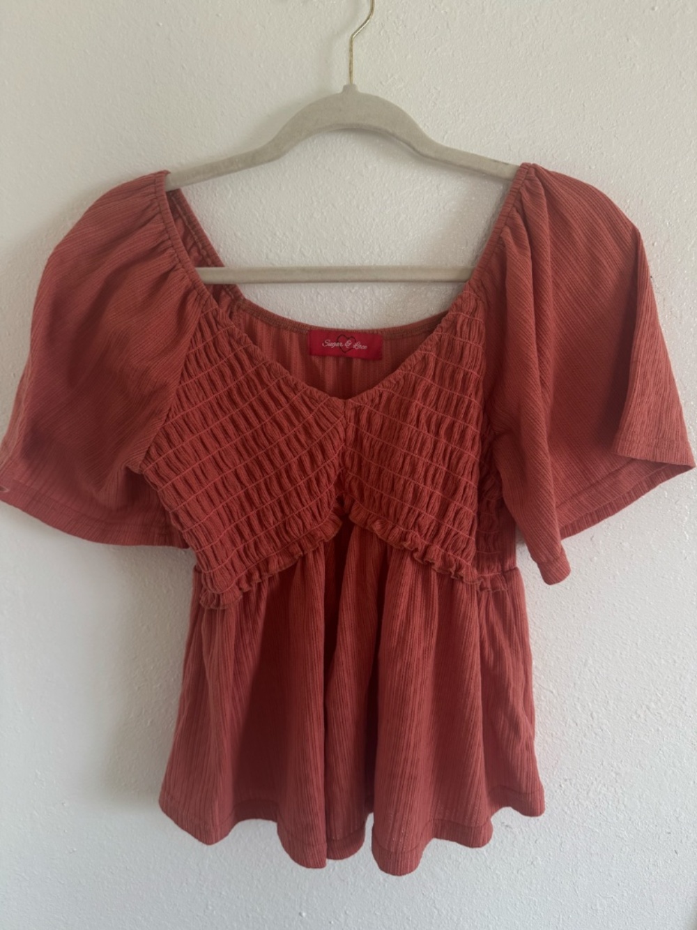Sugar and Lace orange blouse.